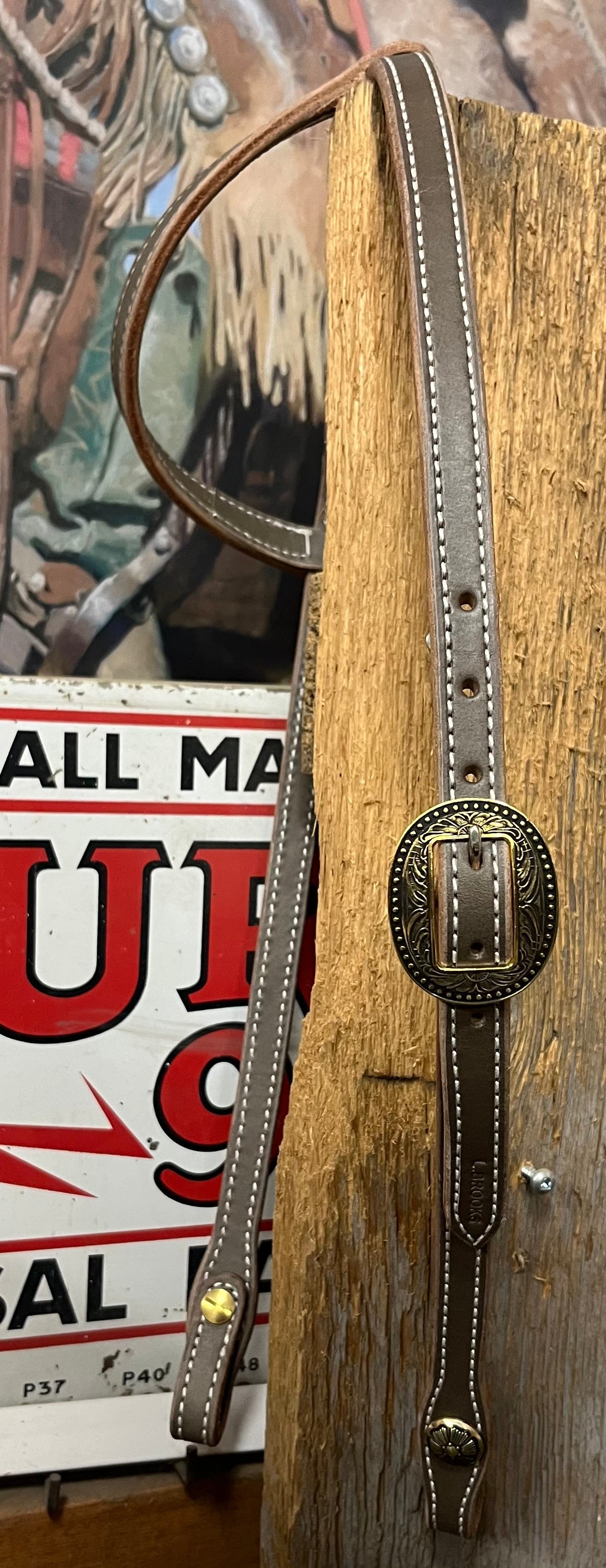 Single sliding ear-single Brooks buckle