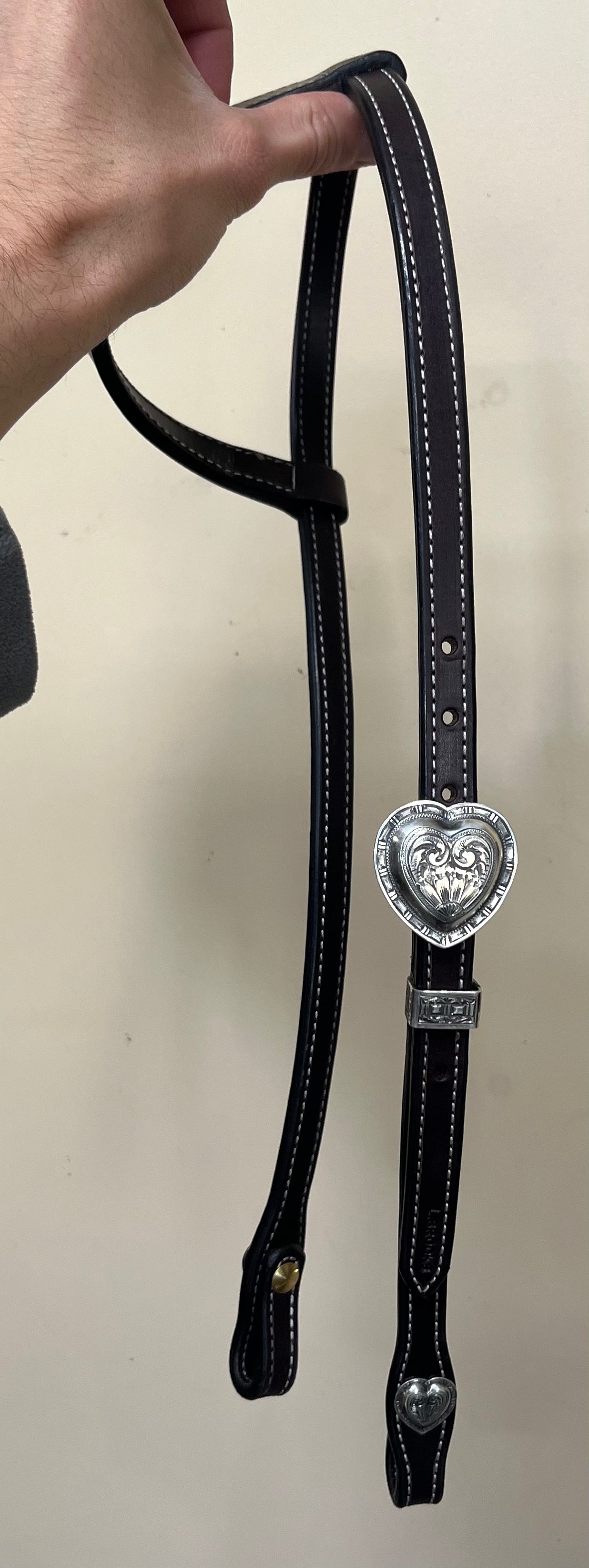 Single sliding ear with hand engraved hardware (card patterns)